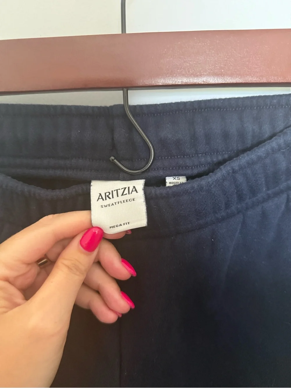 Aritzia Cozy Sweatfleece Mega sweatpants in a dark blue colorway